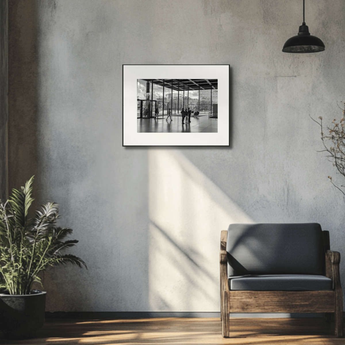 APHEUM Frame L an einer lasierten Wand